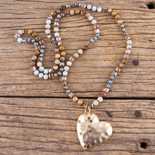 Cargar imagen en el visor de la galería, Crystal-Knotted-Metal-Heart-Pendant-Necklace.jpg